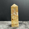 CLA5 - trụ đá Crazy Lace Agate trên bàn