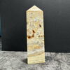 CLA7 - Trụ đá Crazy Lace Agate trên bàn