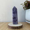 Trụ đá Purple Lepidolite trên bàn 2