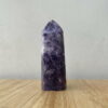 Trụ đá Purple Lepidolite trên bàn 1