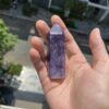 Trụ đá Purple Lepidolite trên tay