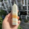Yellow Calcite /w Chalcedony trên tay - YC4
